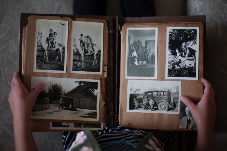 black and white photos in old scrapbook