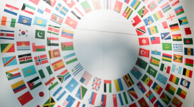 Circular graphic of flags from around the world