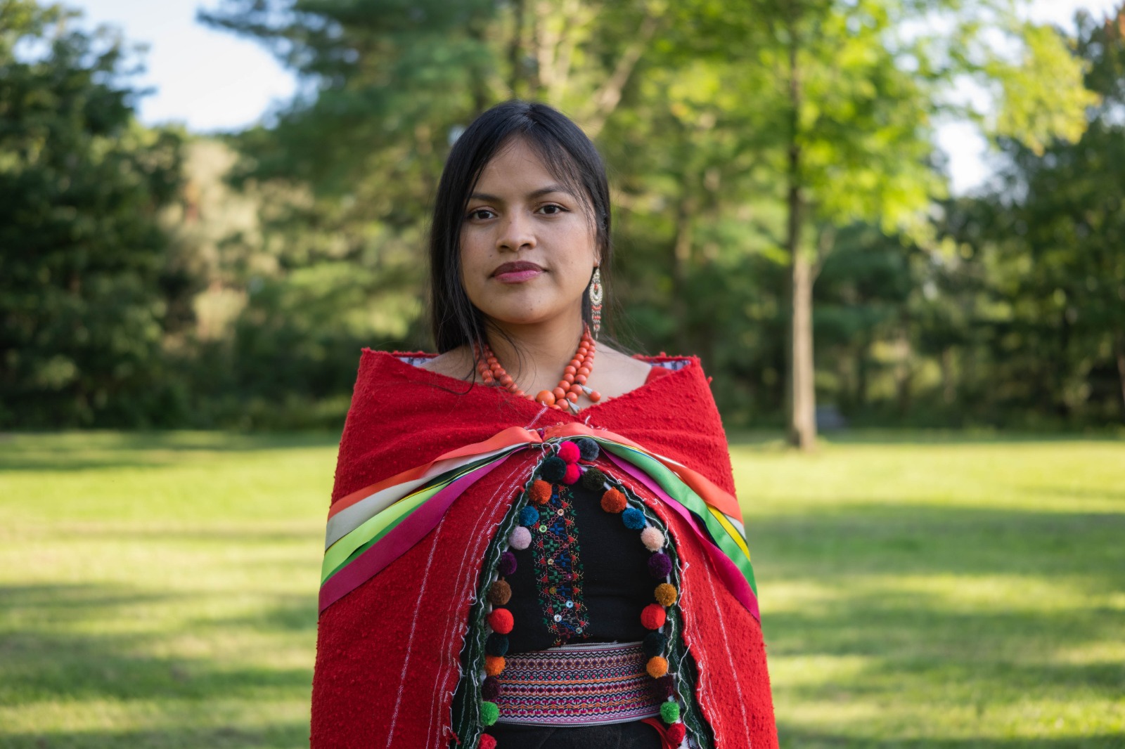 Soledad Chango portrait in red cloak