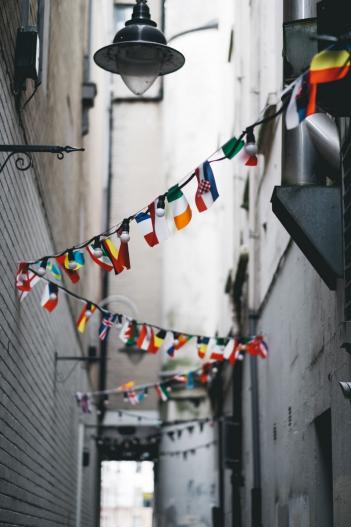 Flags strung across a passageway