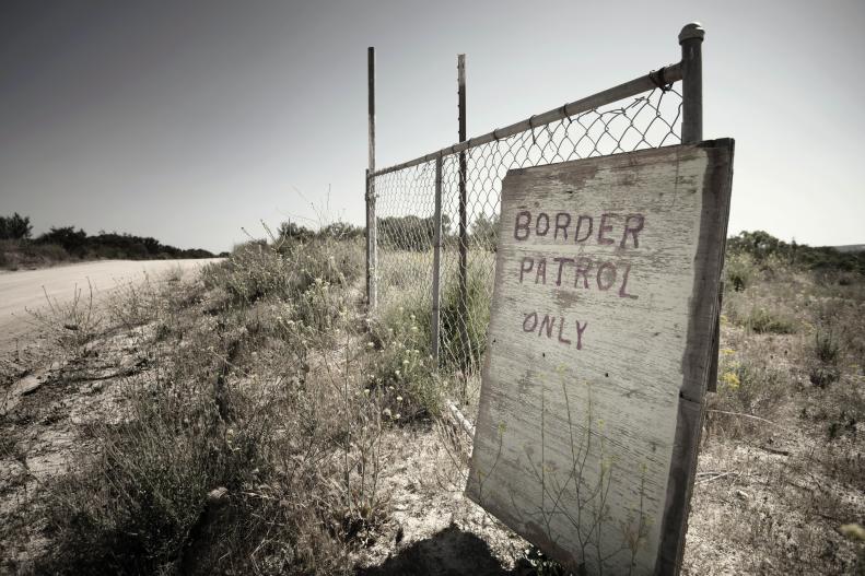 Border patrol only sign near the border in Campo, CA
