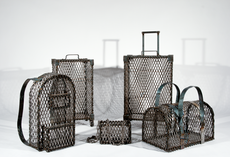 Sabrina Haertig's Sculture S.1200-99th Congress, aka Caged Baggage referring to humans caged at the border.