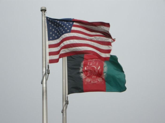 US and Afghanistan flags flying DVIDS byTech Sgt Oneika Banks_03152012