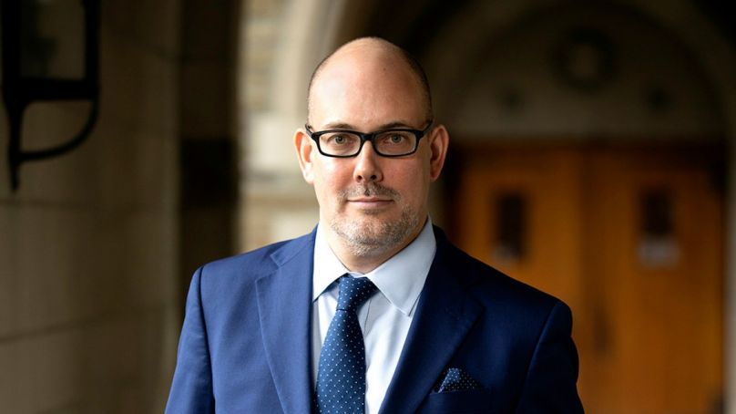 Jens David Ohlin in blue suit