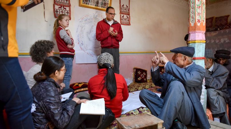 Kassam talks with herders and farmers in Post Doct Village in Xinjiang, China