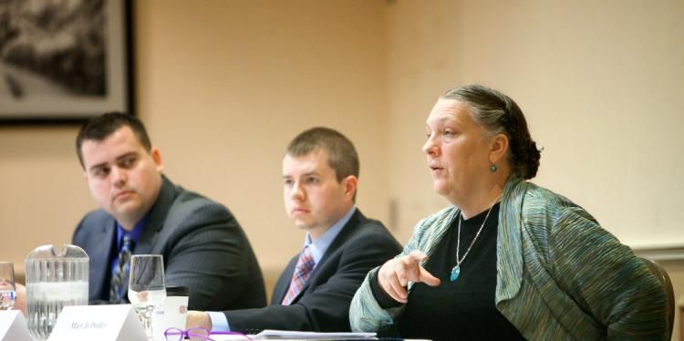 Panel of faculty members speaking