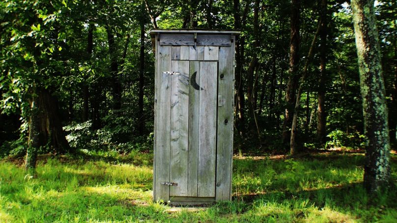 outhouse in woods