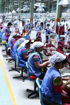 Line of workers sewing in crowded Bangladesh garment factory (Photo by Bangladesh Garment Manufacturers and Exporters Association) 