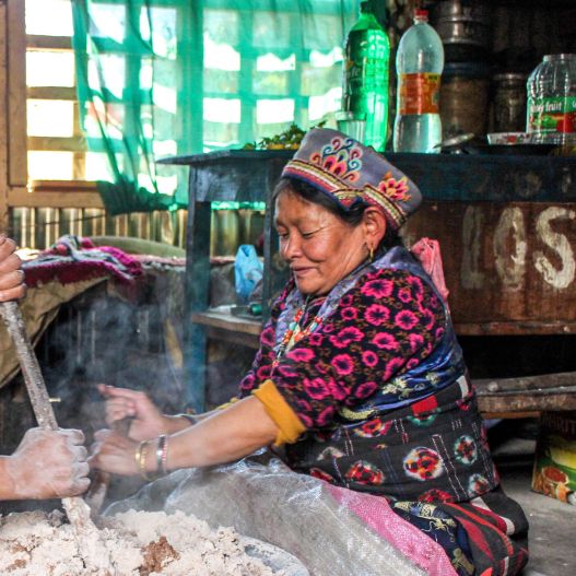 Nepali woman cooking