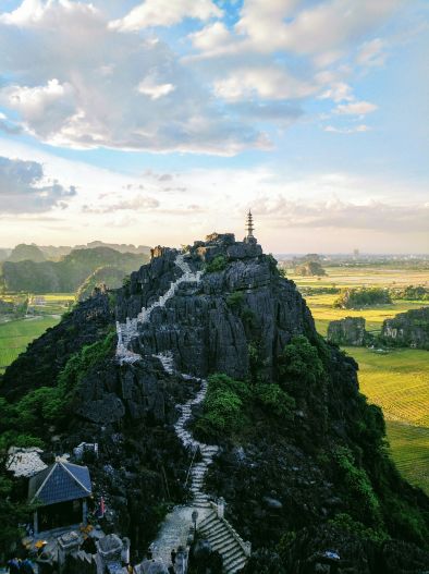 A photo of a mountain with a pagoda in Ninh Bình Province, Vietnam
