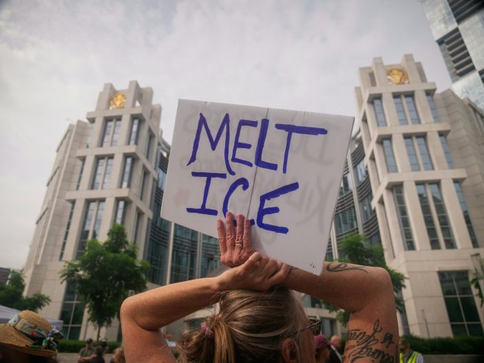 Protester holds a sign that reads "MELT ICE" in front of the Nashville Federal Courthouse during the arraignment trial for Kilmar Abrego Garcia.