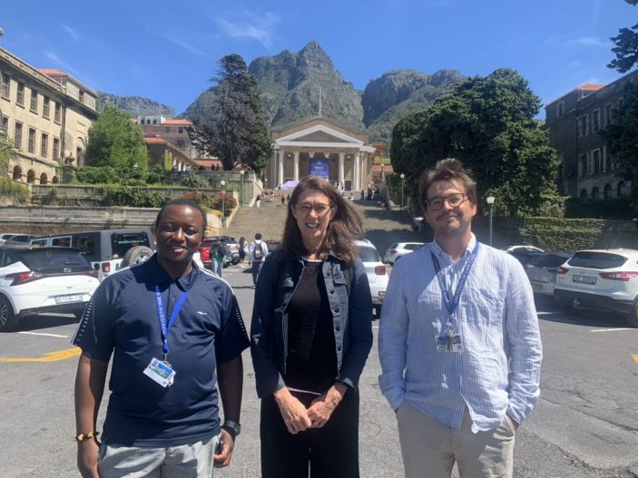 Vice Provost Wendy Wolford (center) met with Eric Ndoh (left) and Diego Quiros (right) at the University of Cape Town in October 2025.