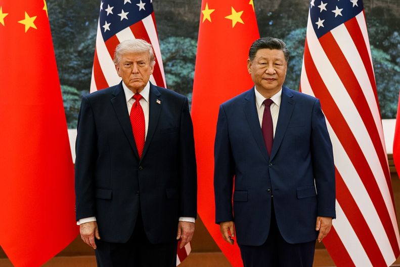 Donald Trump participates in a welcome ceremony with Xi Jinping in Beijing, China