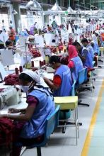 Line of workers sewing in crowded Bangladesh garment factory (Photo by Bangladesh Garment Manufacturers and Exporters Association) 