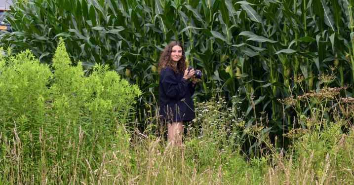 Laidlaw scholar Melanie Marshall photographs insects in a field