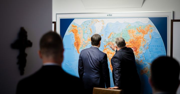 Secretary Marco Rubio meets with Hungarian Prime Minister Viktor Orban in Budapest, Hungary, February 16, 2026. They look at a world map with their backs to the camera.
