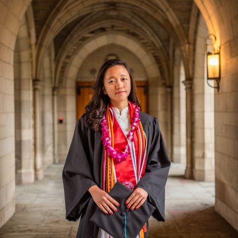 Savanna Lim '21 in graduation robes
