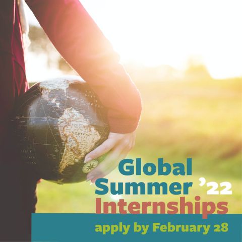Apply by Feb. 28 student holding globe