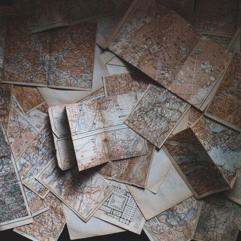 A pile of paper maps.
