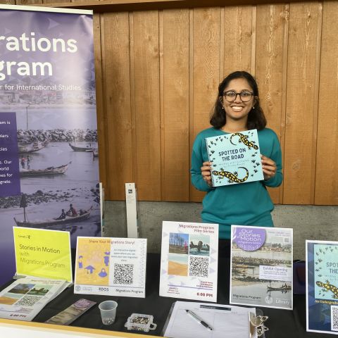 Trisha Bhujle holds her book, "Spotted on the Road."