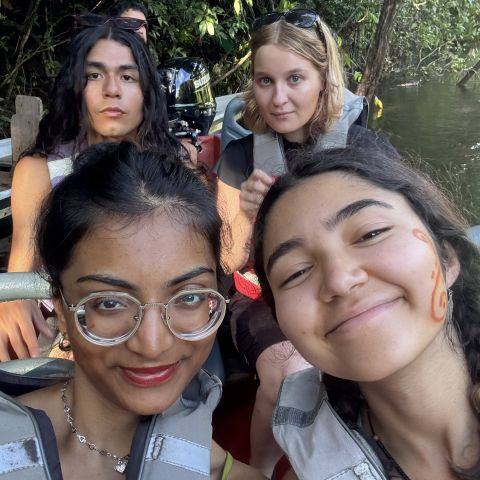 Aima Raza and fellow Laidlaw scholars on a boat in Ecuador.